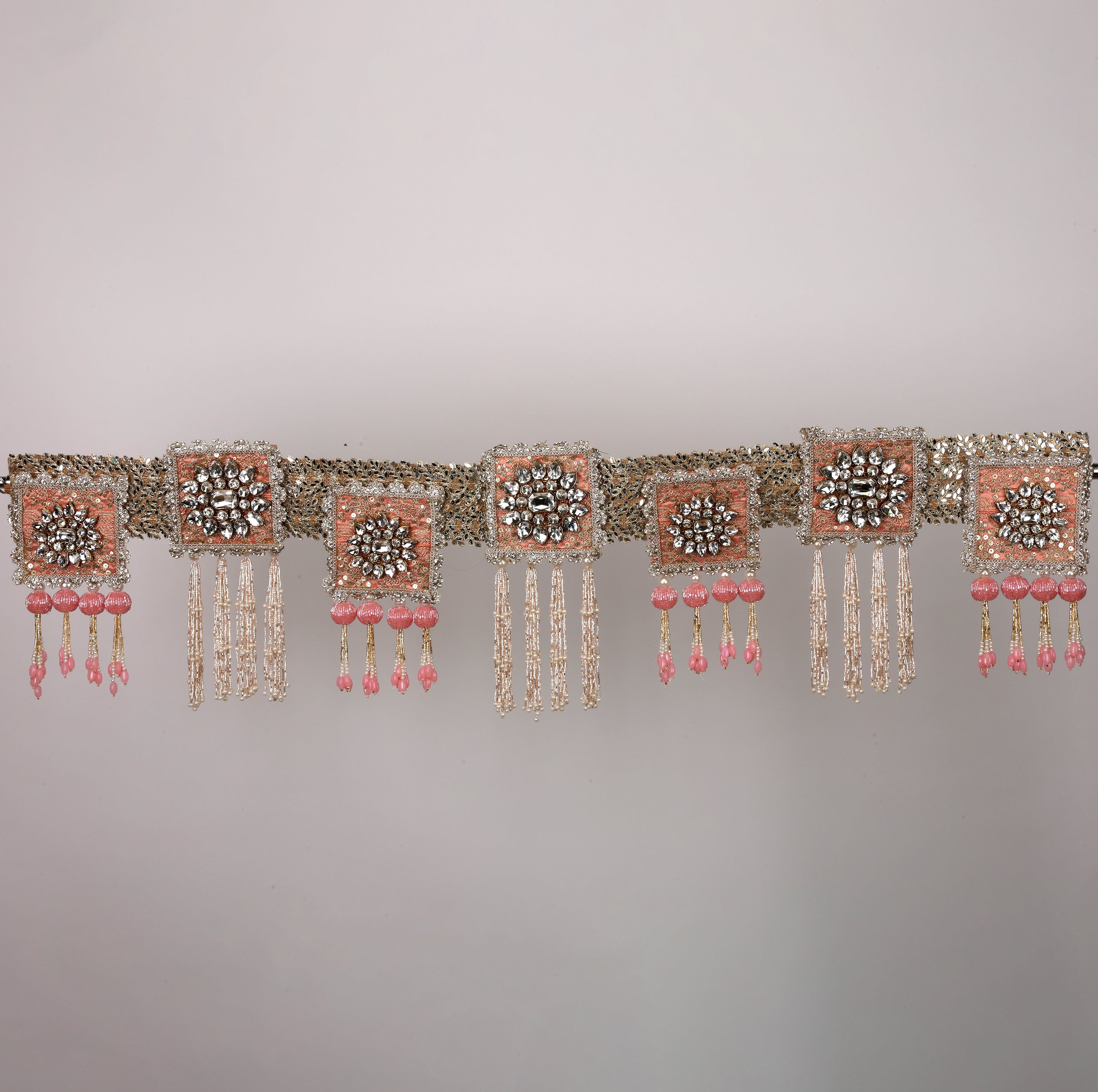 Varnika Toran – Elegant Peach & Pink Decorative Door Hanging with Crystal Embellishments