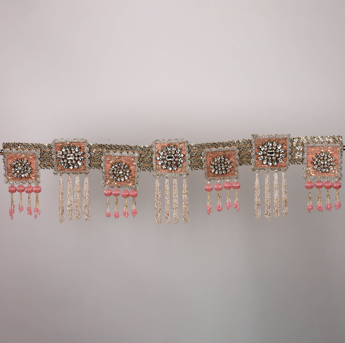 Varnika Toran – Elegant Peach & Pink Decorative Door Hanging with Crystal Embellishments